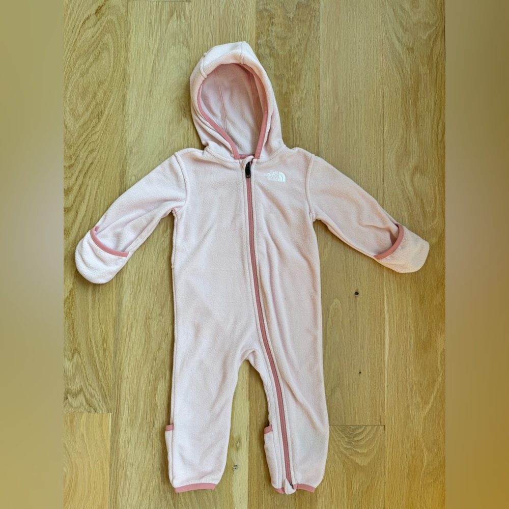 North face baby fleece one piece. Gently used 6-12 months. Pink. Super cozy.